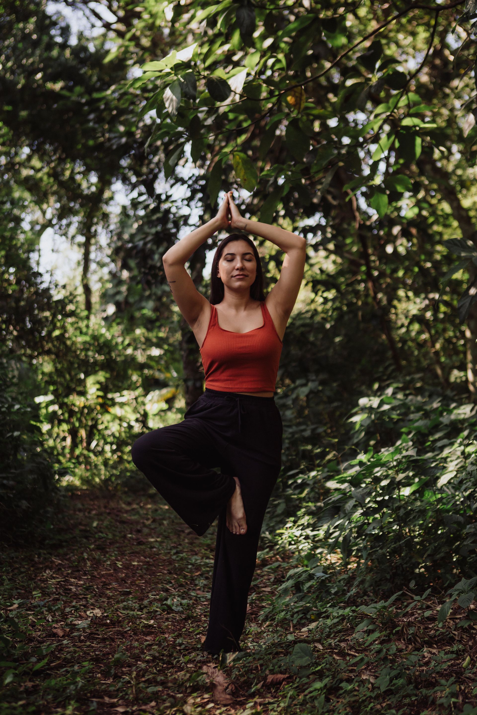 Guest enjoying a peaceful yoga or meditation session in the heart of the Misiones jungle at Overo Lodge.