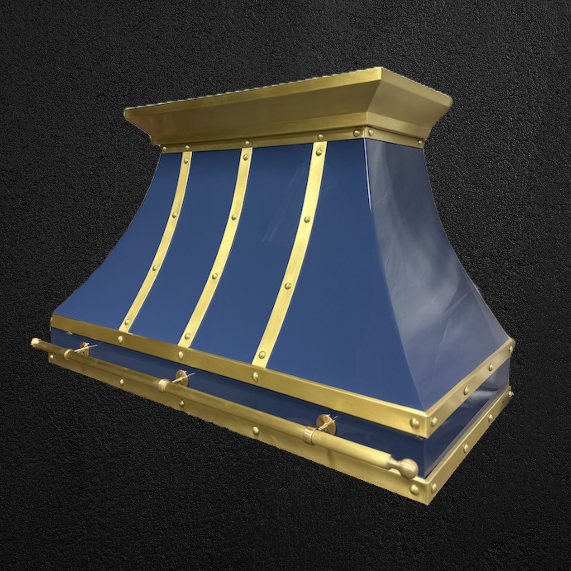 A blue and gold hood is sitting on a black surface
