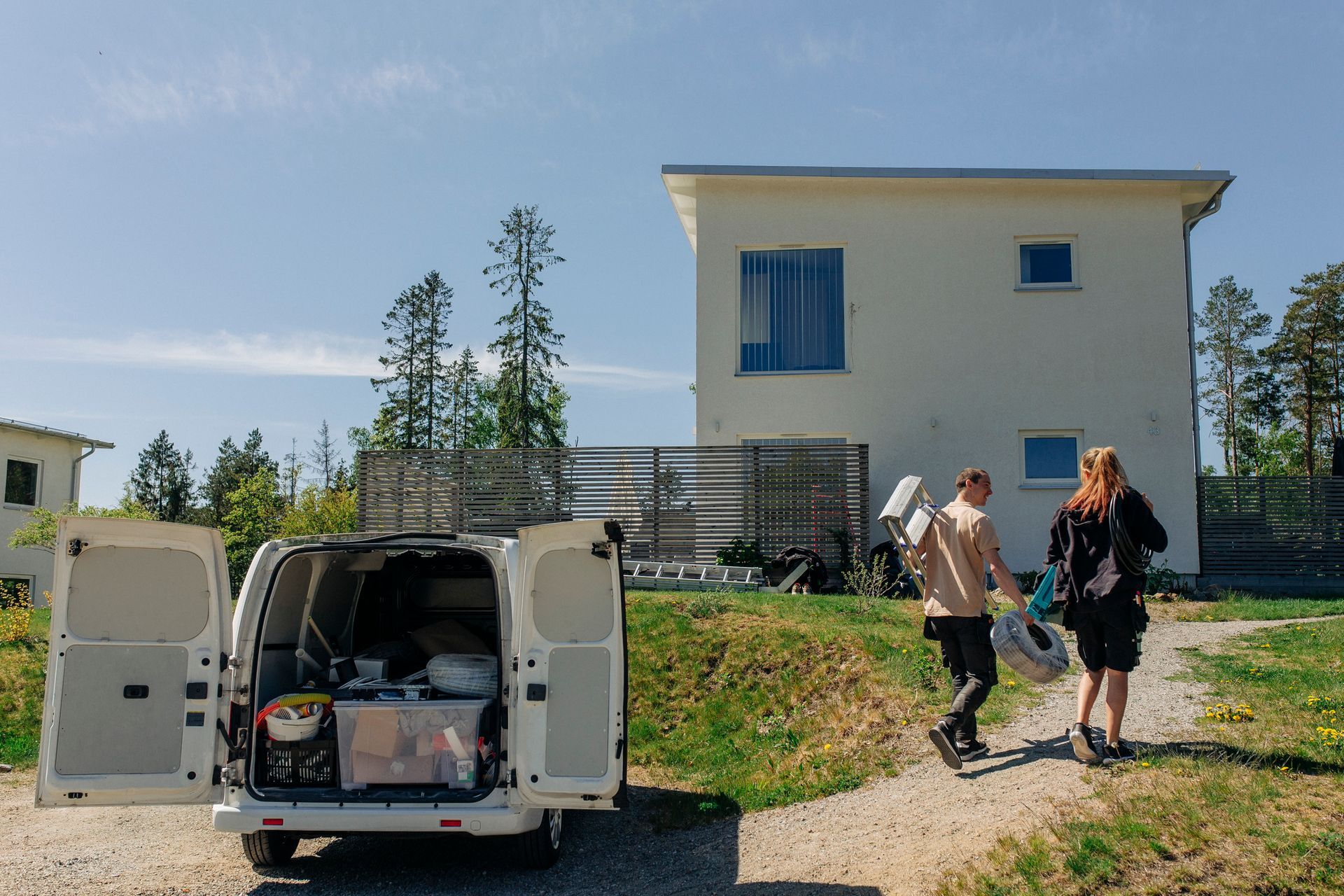 An electrician is going to the residential area An electrician is going to the residential area