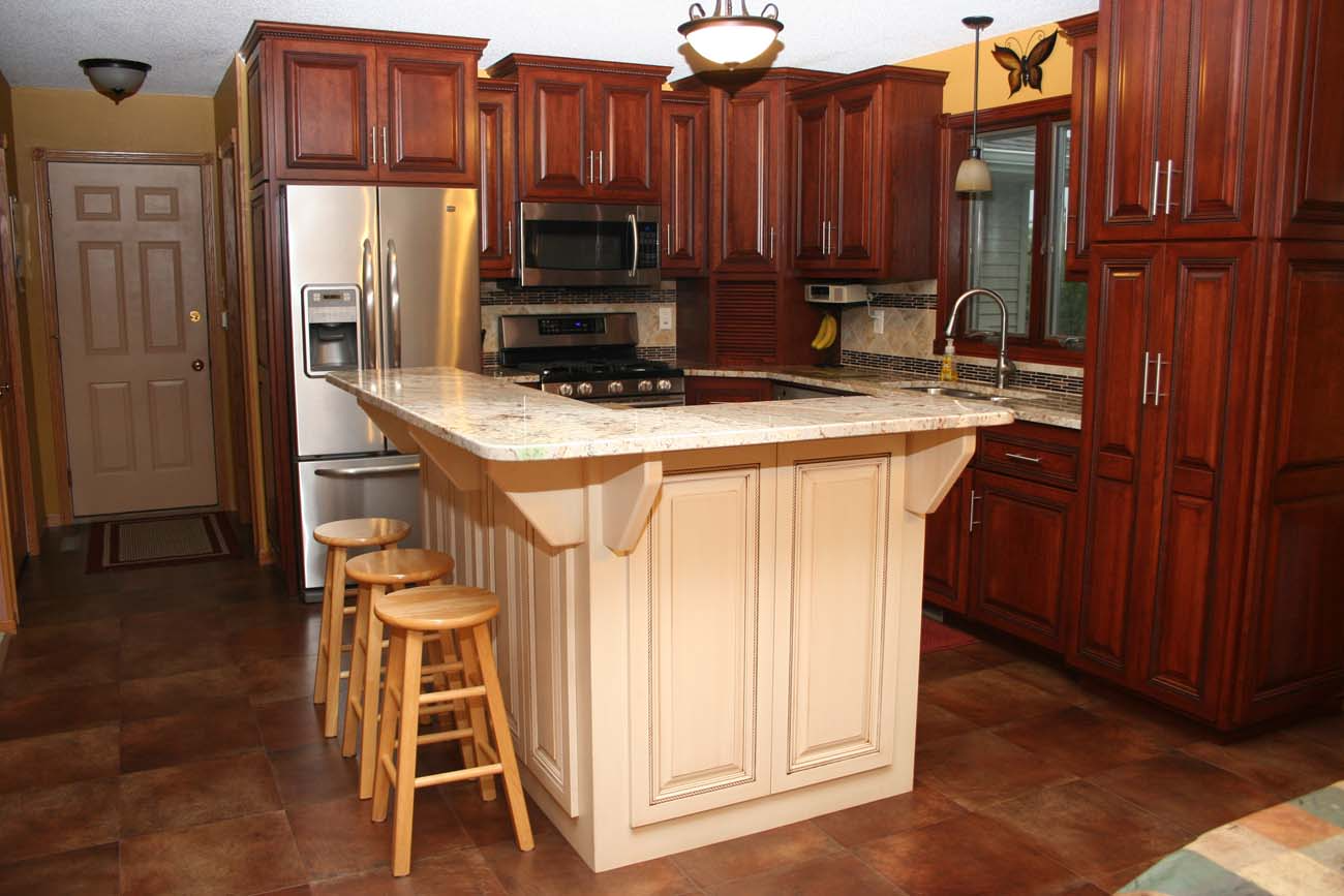 A kitchen with a large island and stools