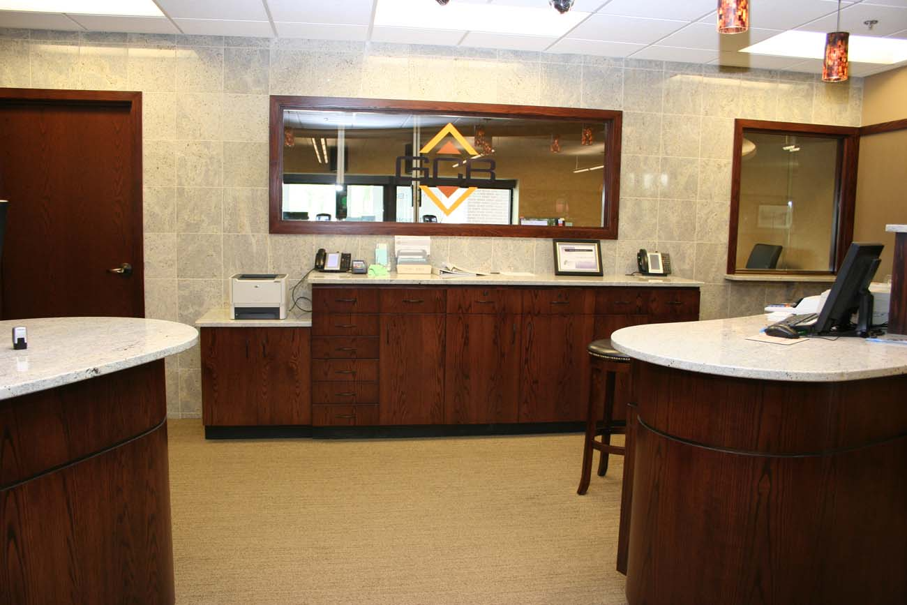 A dental office with a large mirror on the wall