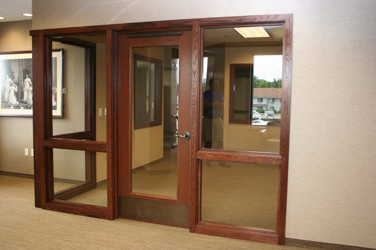 A room with a lot of windows and doors