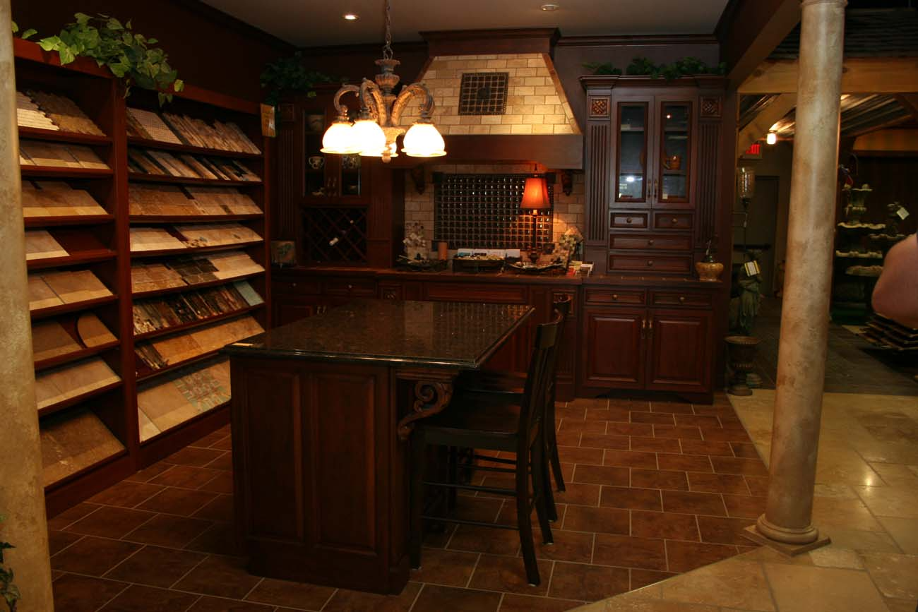 A kitchen with a large island in the middle of it