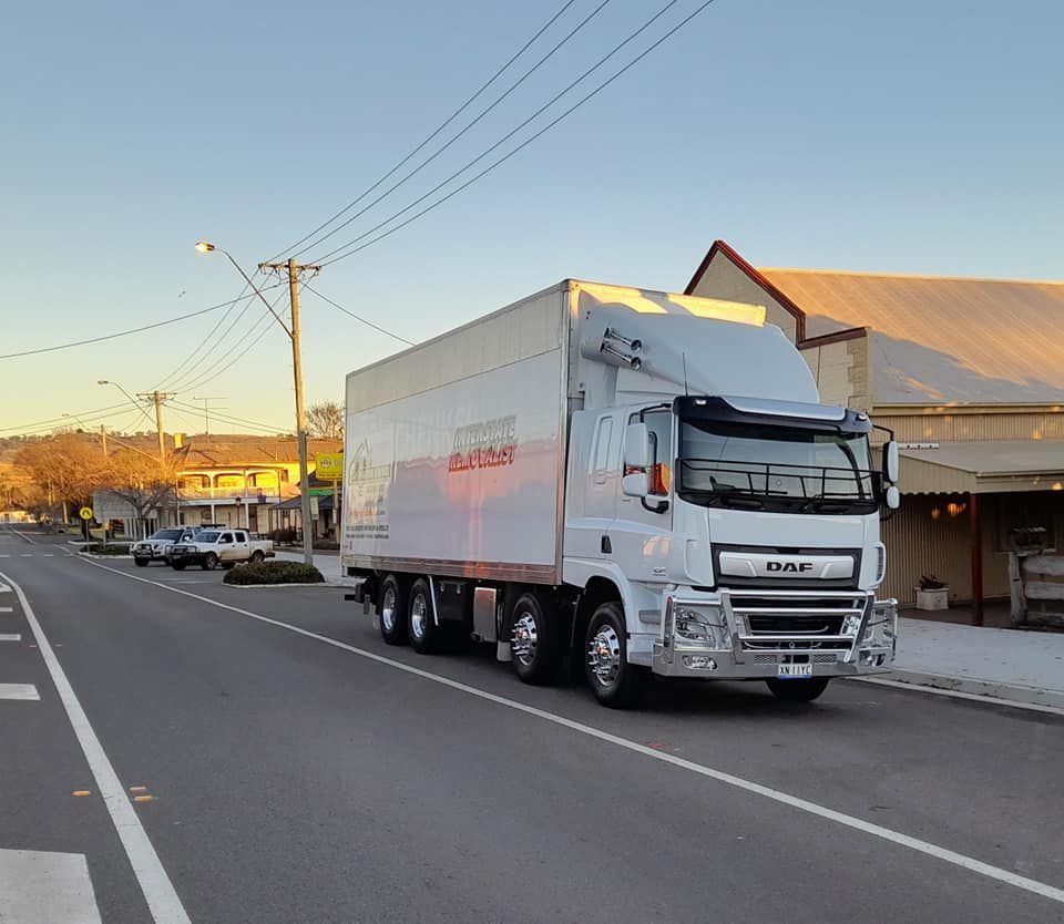 A Daf Truck Is Parked On The Side Of The Road — Gordy's Furniture Removals in Bathurst, NSW