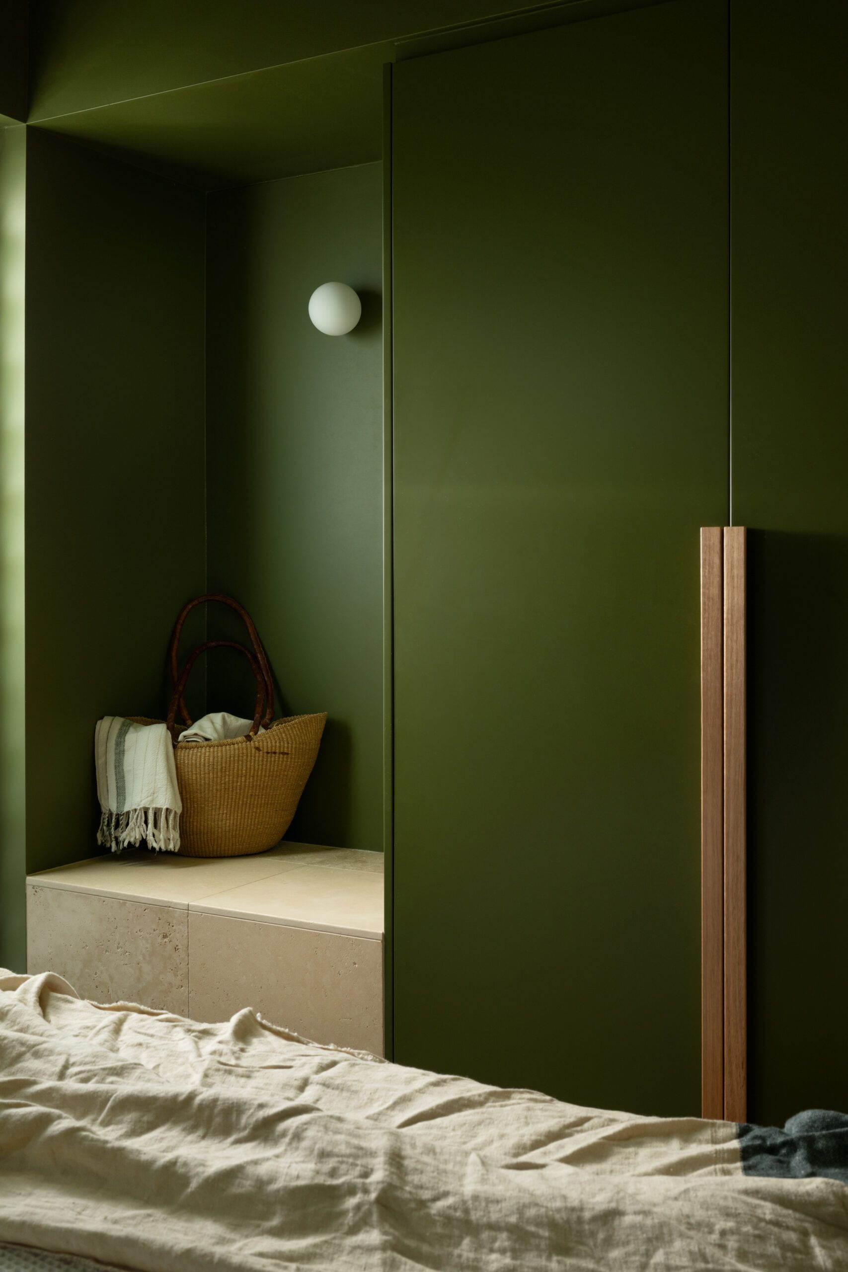 A Bedroom Nook With Dark Olive Walls — Foreshore Kitchens in Coolum, QLD