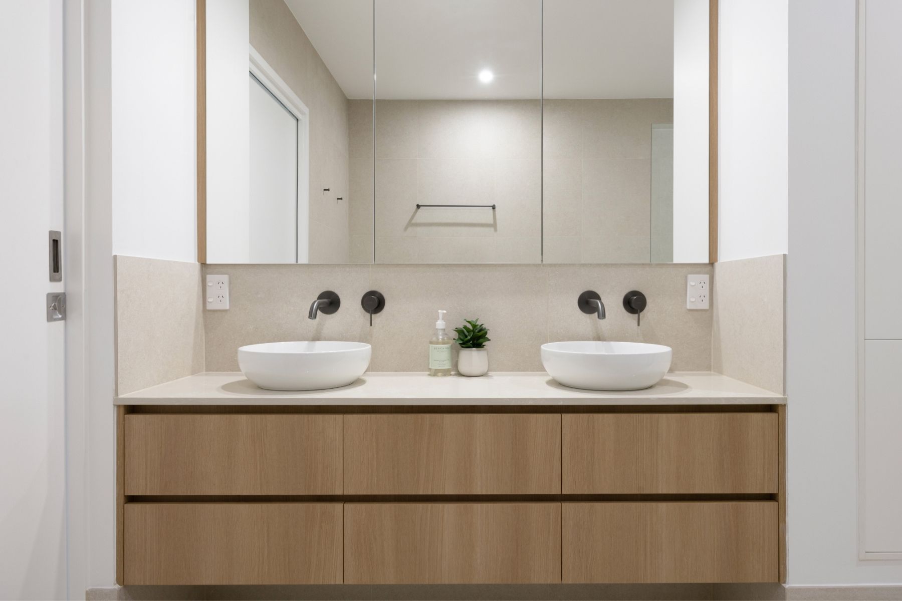Modern Kitchen With Dark Cabinetry, Wooden Accents — Foreshore Kitchens in Coolum Beach, QLD