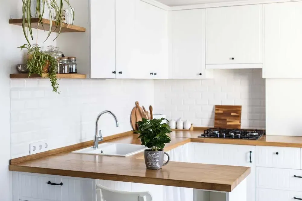 White Kitchen With Wooden Countertops — Foreshore Kitchens in Coolum Beach, QLD