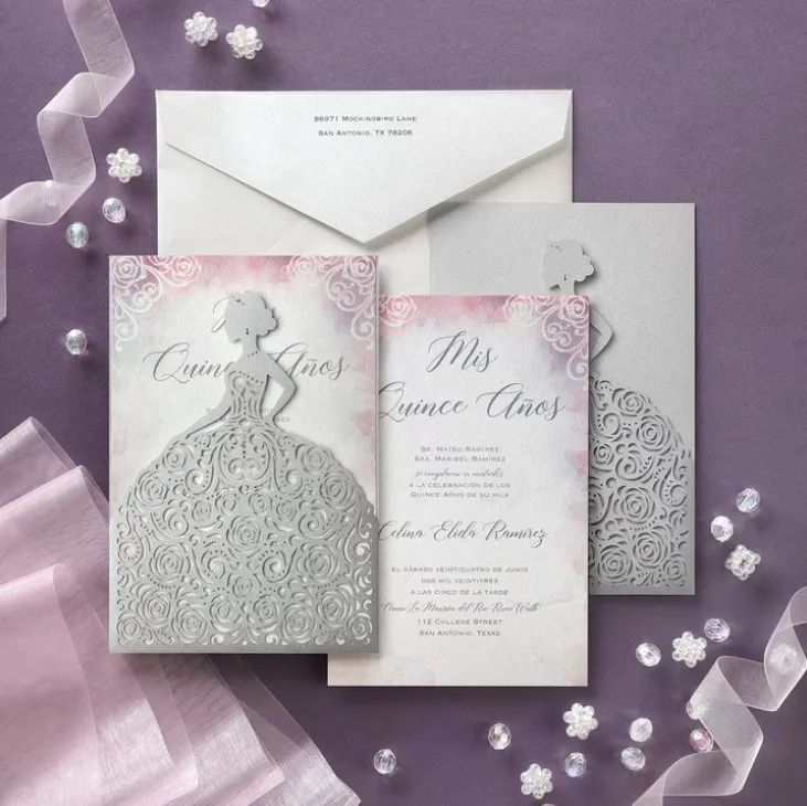 A quinceanera invitation with a woman in a dress