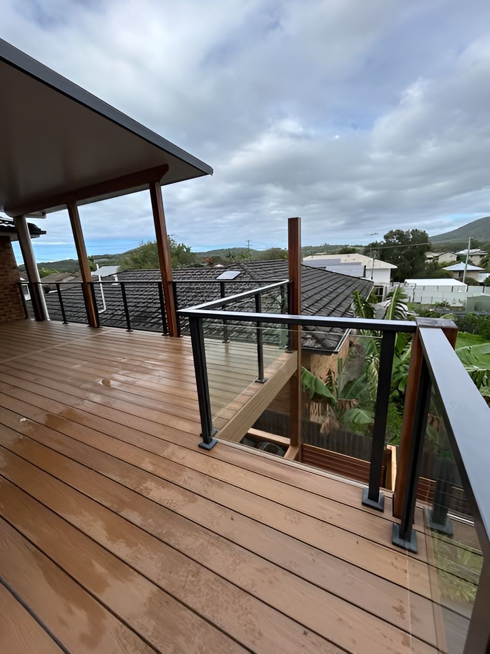 Wooden Deck with Glass Railing and A Roof — Envy Glass in Nambucca Heads, NSW