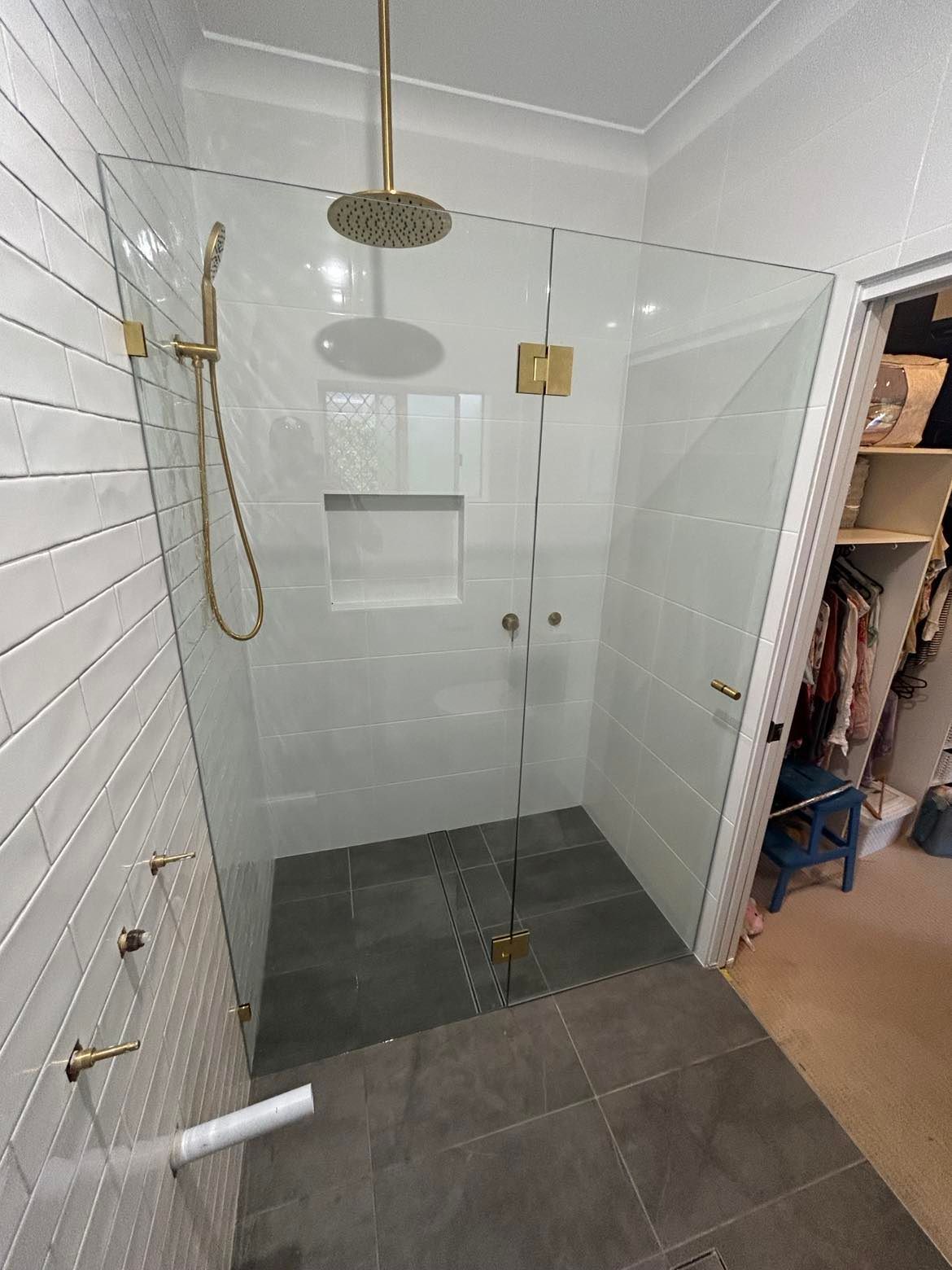 Modern Shower Stall with Gold Fixtures and Gray Tile  — Envy Glass in Nambucca Heads, NSW