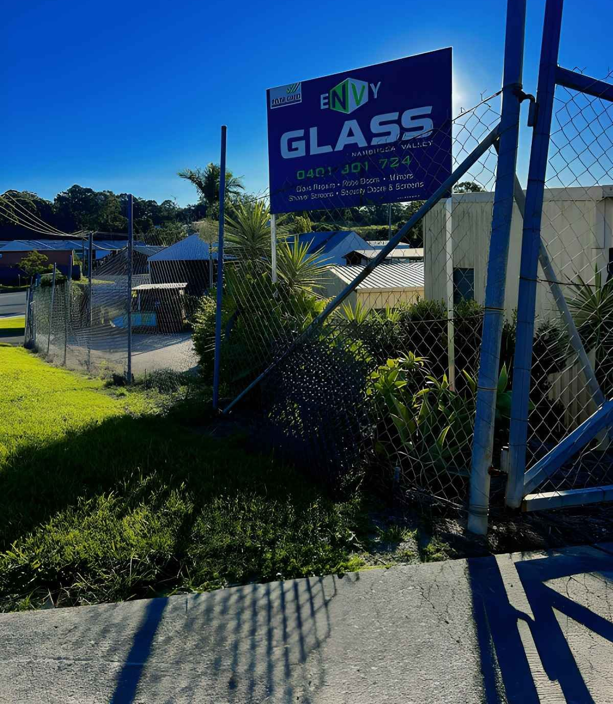 A Business with A Fence and Sunny Background — Envy Glass in Nambucca Heads, NSW
