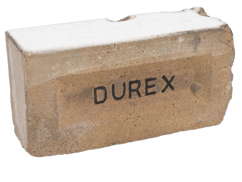 Red brick with the word 'Durex' carved into it