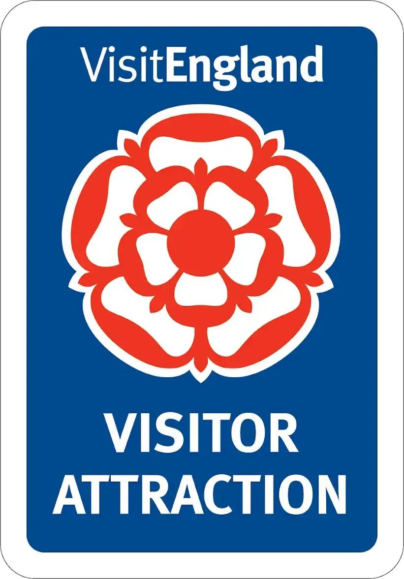 A blue sign that says visitengland visitor attraction