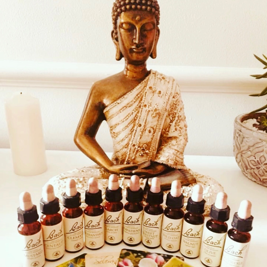 meditation statue and essential oils