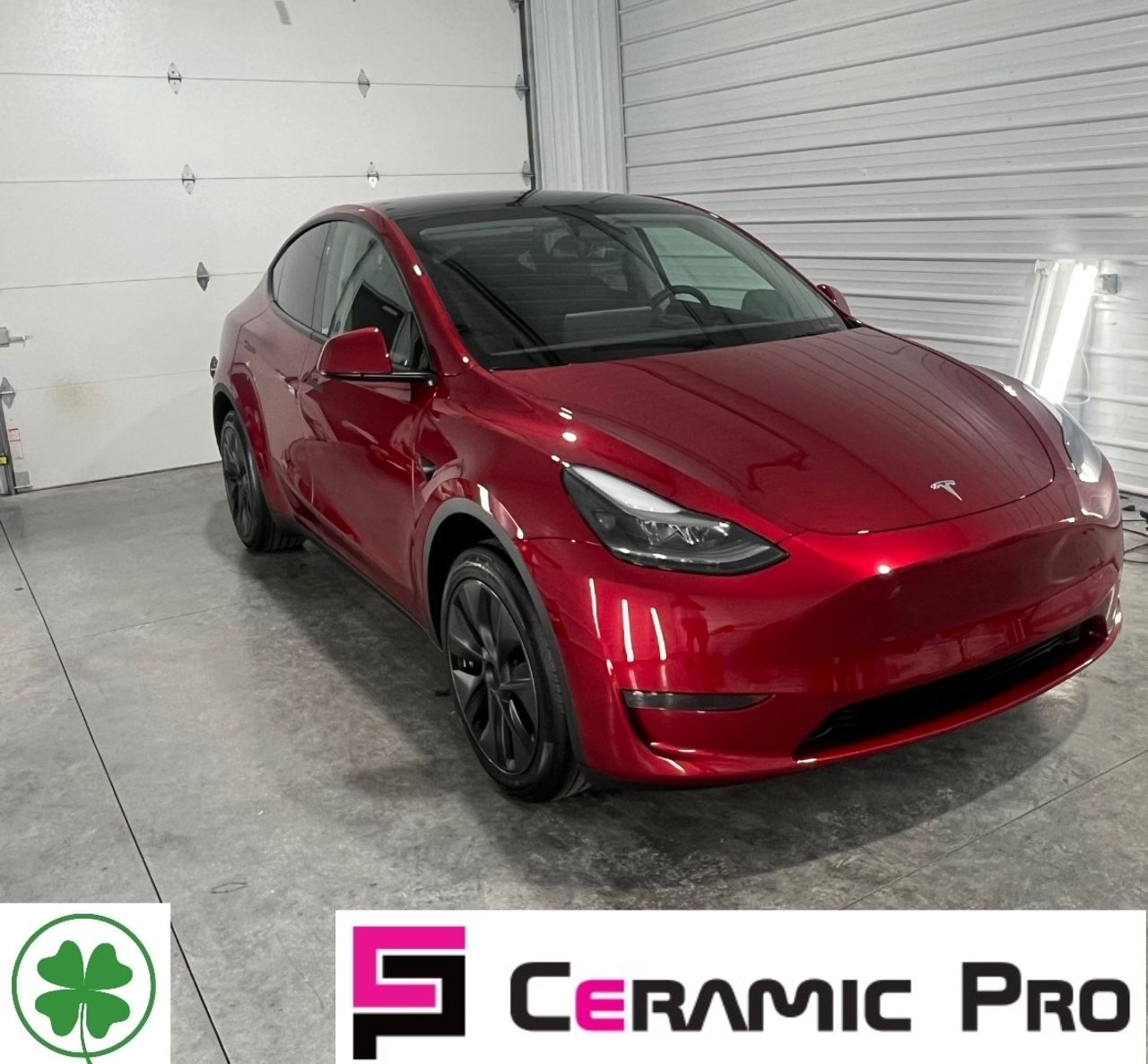 Red Tesla SUV in a garage with Ceramic Pro and shamrock logos at the bottom