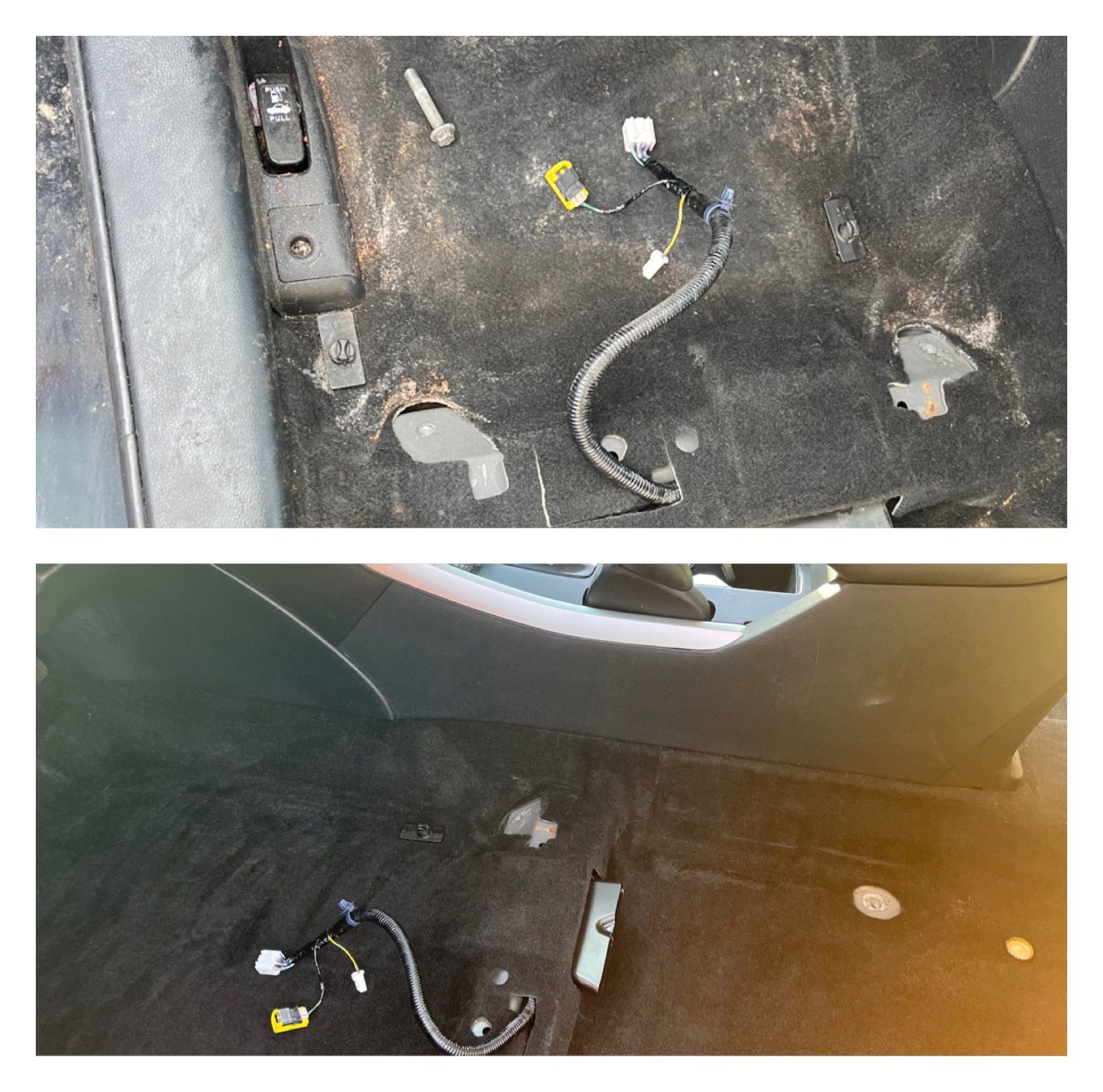 Black pickup truck parked indoors on a wet floor in a garage or wash bay