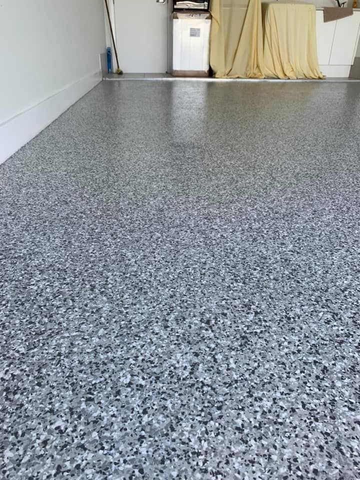 A Close Up Of A Gray Concrete Floor In A Garage — Partlic Painting & Epoxy Flooring In Taree, NSW
