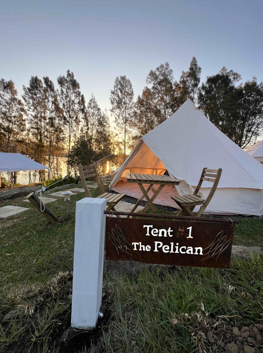A tent with a sign that says tent 1 the pelican