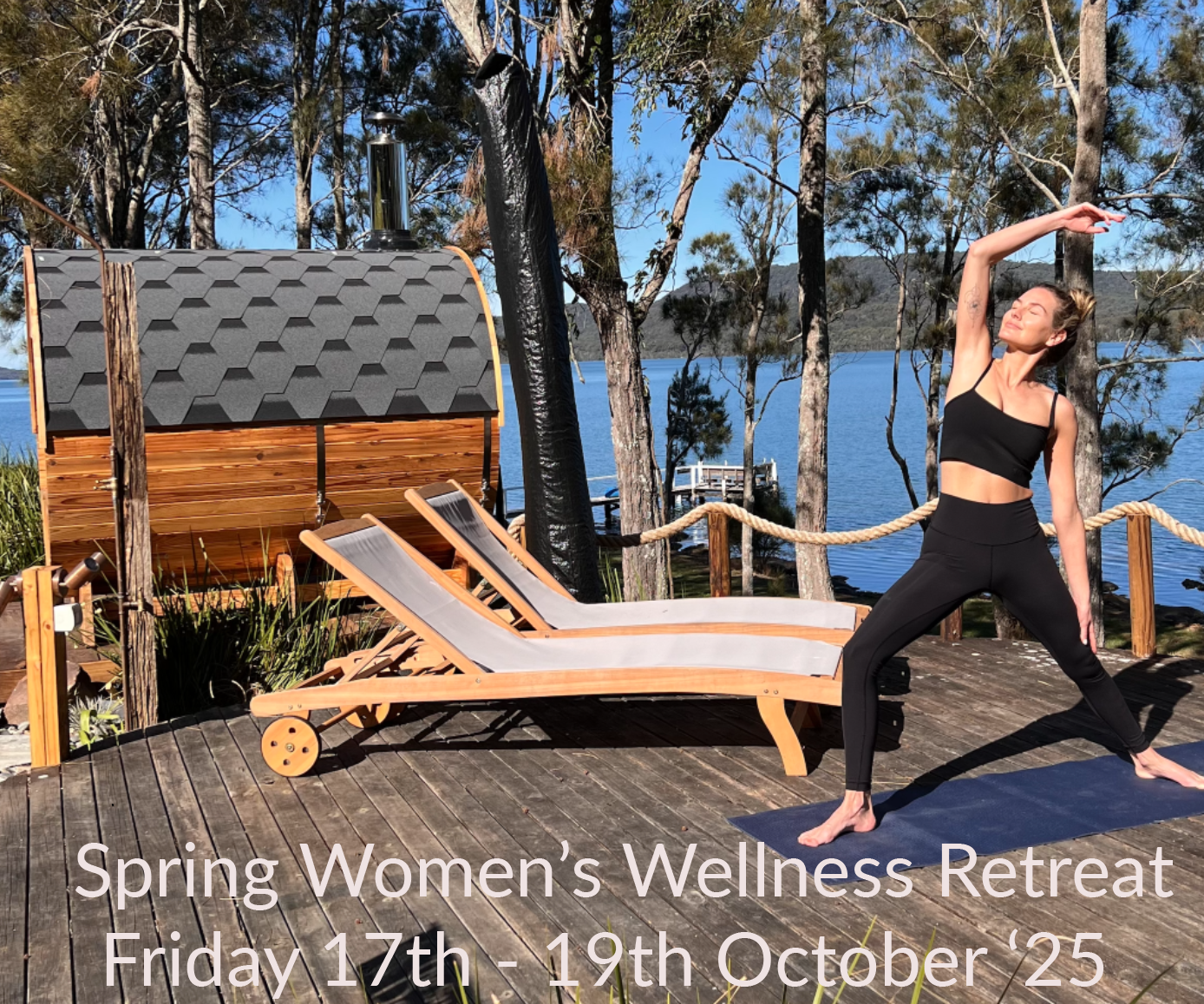 A woman is doing yoga on a deck in front of a sauna.