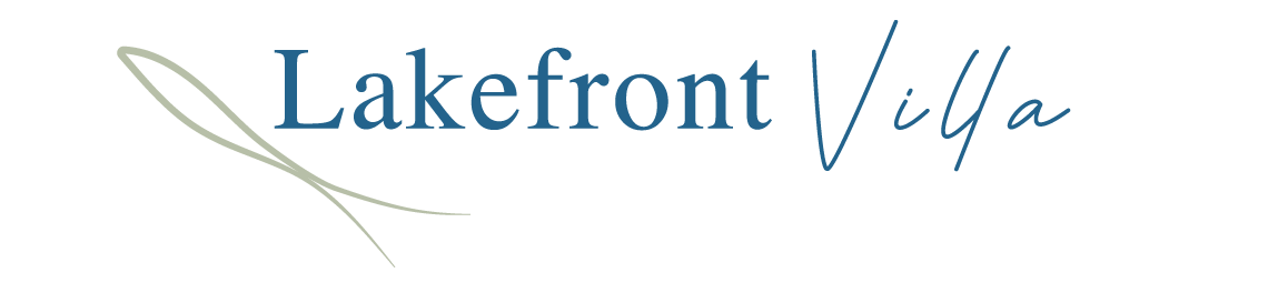 A logo for lakefront villa with a needle in the middle.