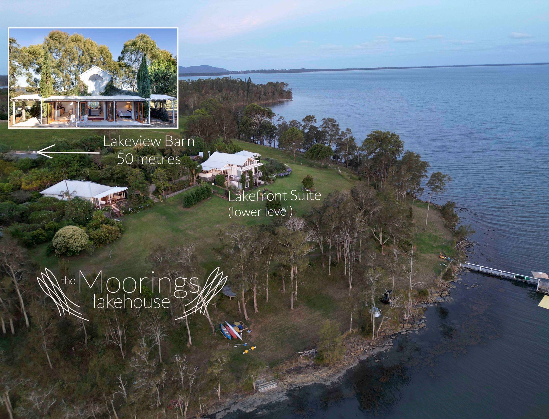 An aerial view of a house on a small island in the middle of a body of water.