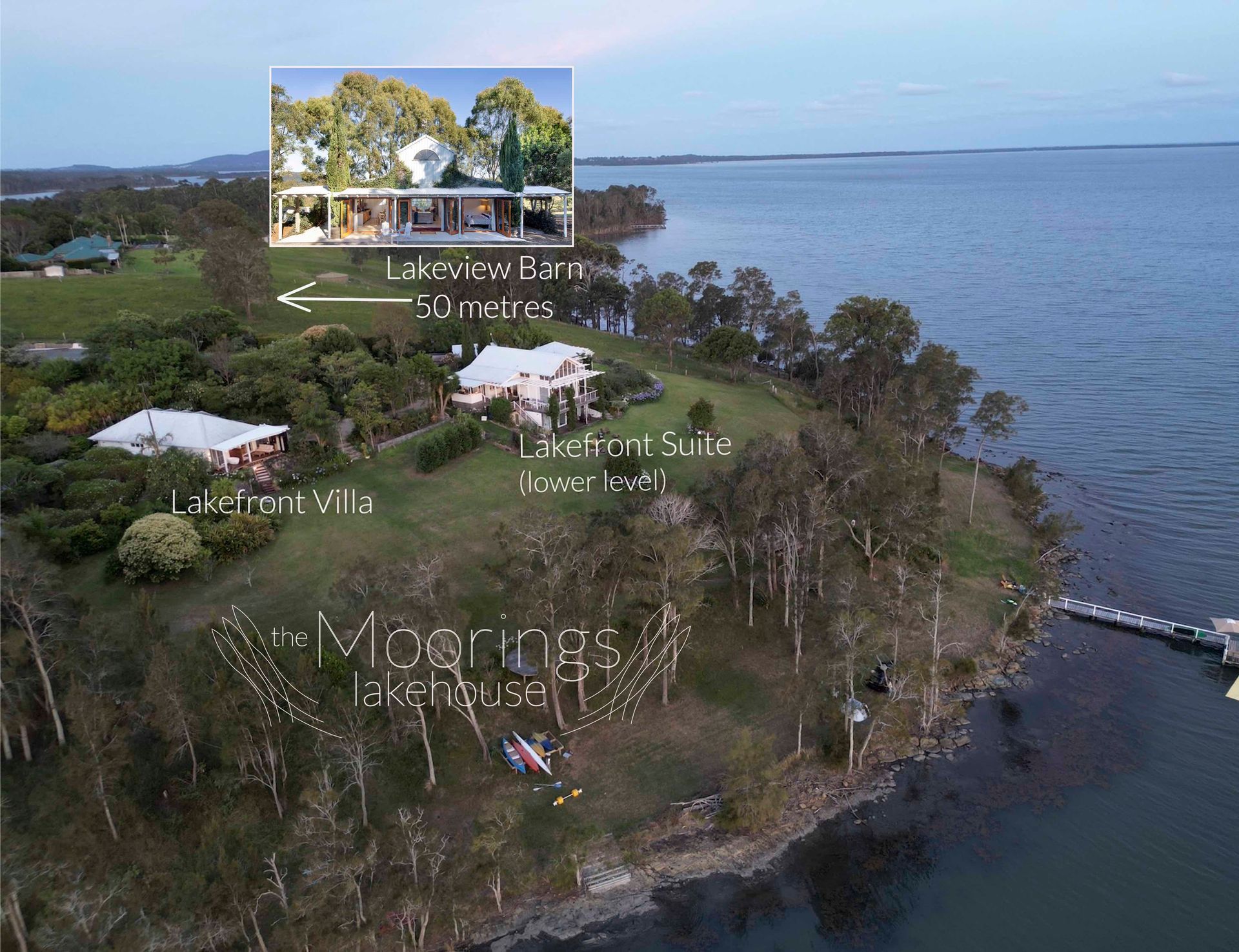 An aerial view of a house on a cliff overlooking a body of water.