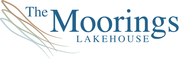 The logo for the moorings lakehouse has a drawing of a boat on it.