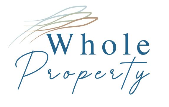 A logo for whole property with a bird on it