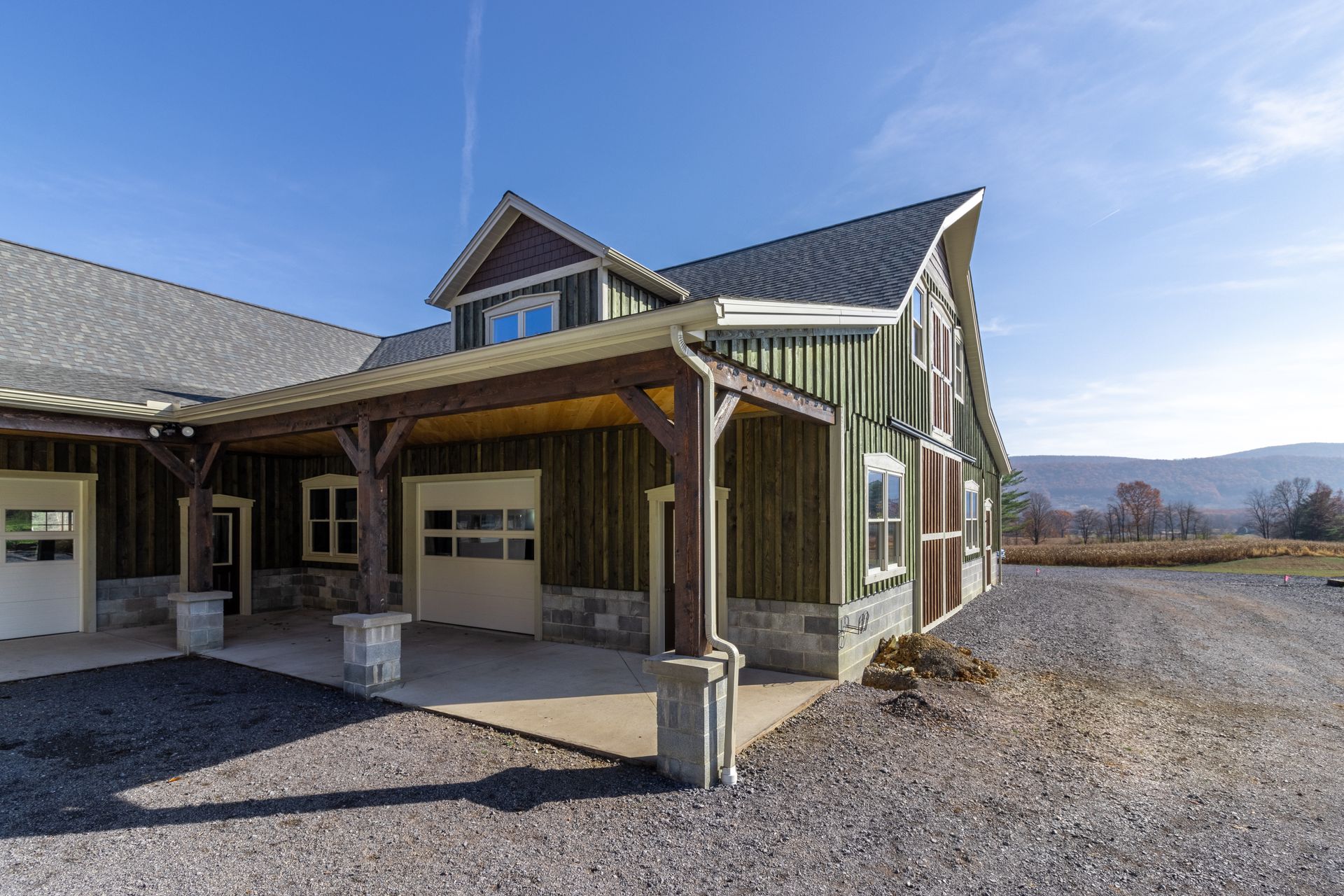 Custom home with garage, wood siding, State College, PA