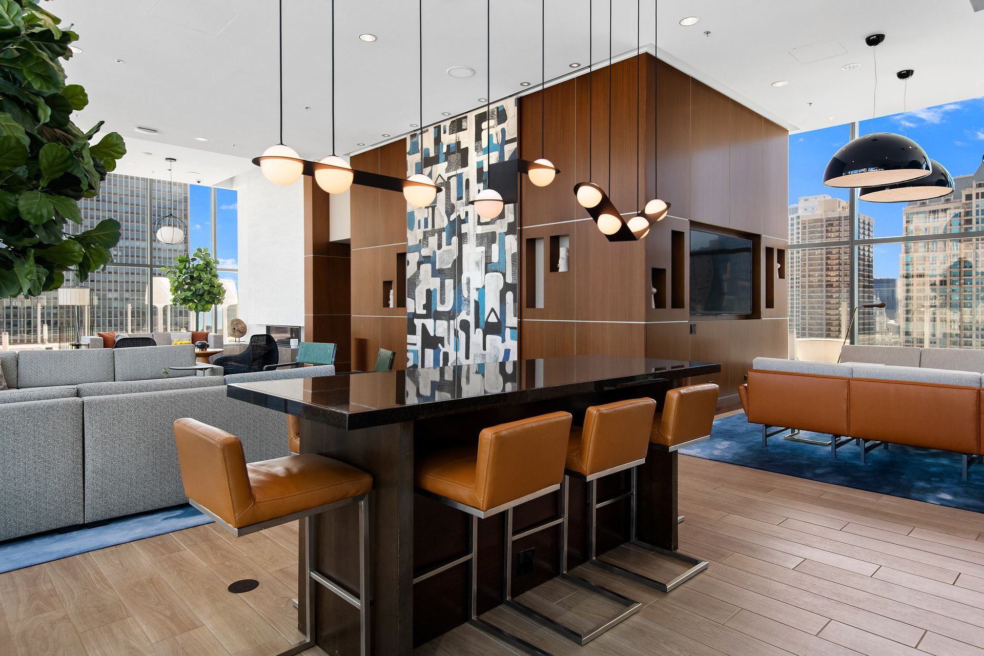 a kitchen and living room with a table and chairs