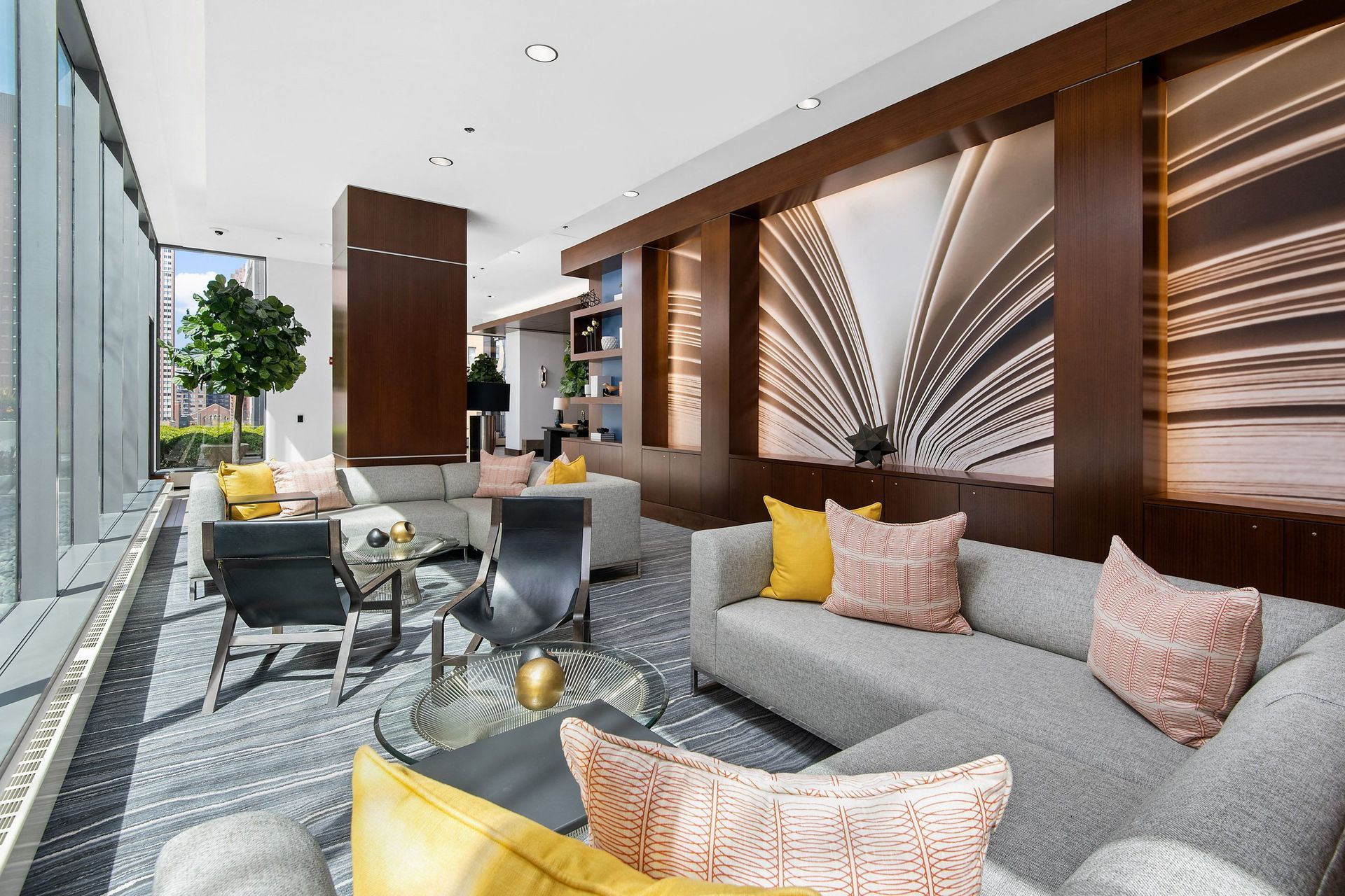 a living room with couches and chairs and a table