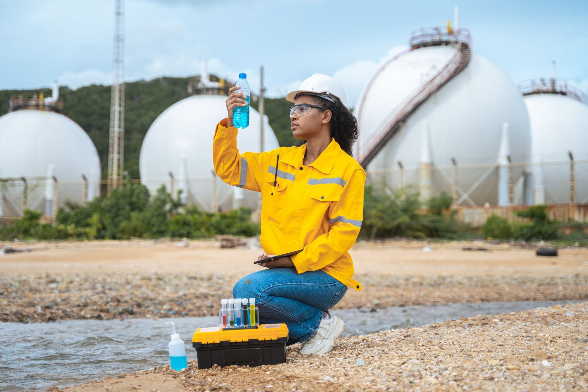 A woman is collecting water samples. A woman is collecting water samples.