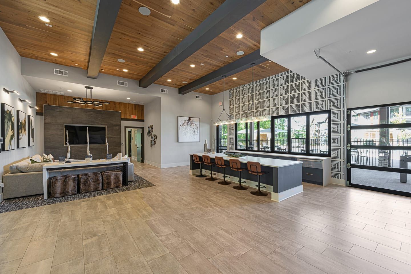 A living room with a lot of furniture and a television