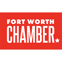 A red sign that says fort worth chamber on it