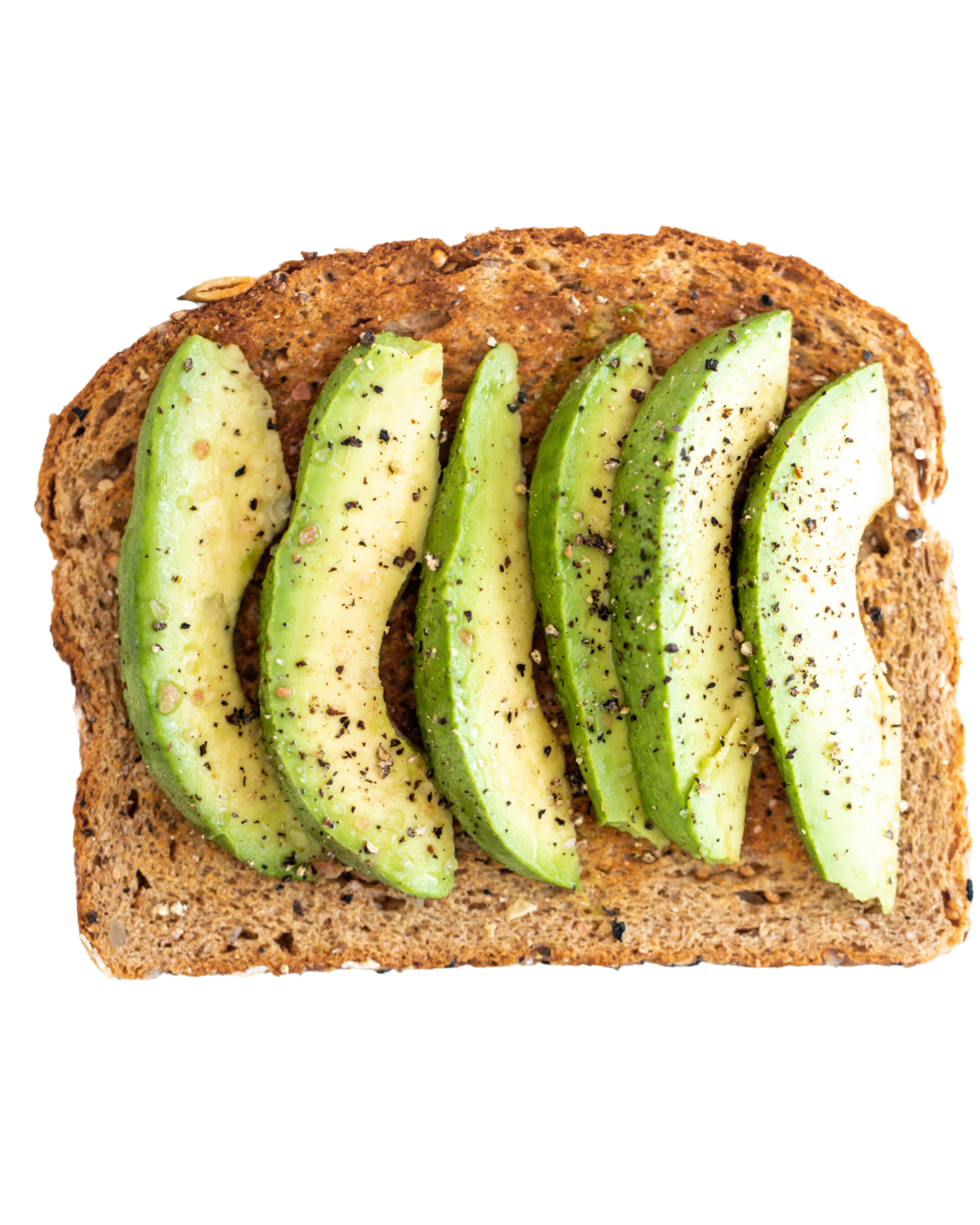 Avocado slices sprinkled with black pepper on toasted brown bread.