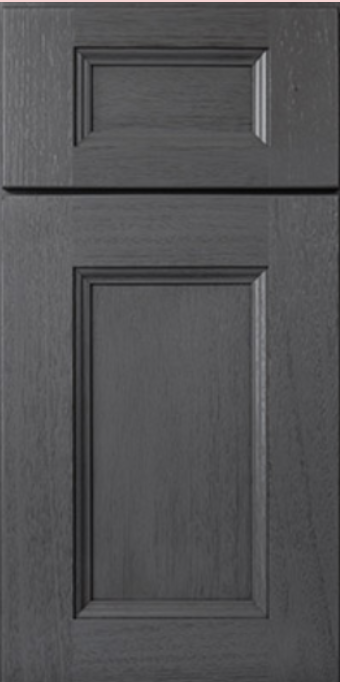 Gray cabinet door with recessed paneling and a raised rectangle detail on top.