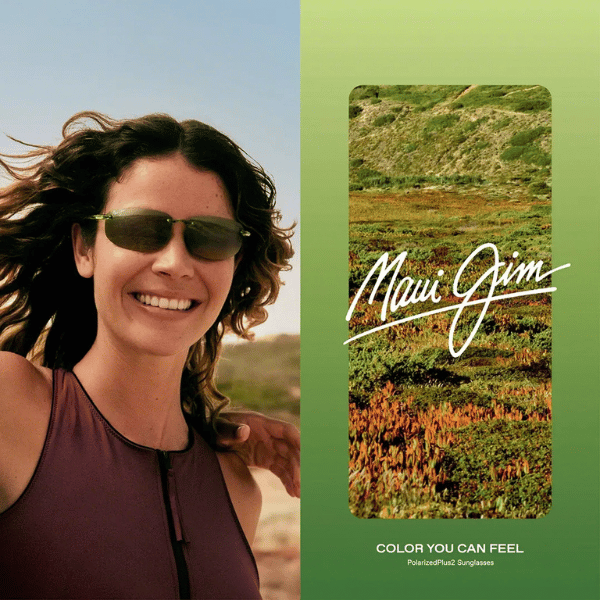 A woman wearing sunglasses next to a maui jim advertisement
