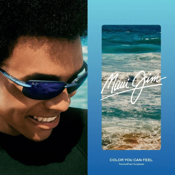 A man wearing sunglasses next to an advertisement for maui jim