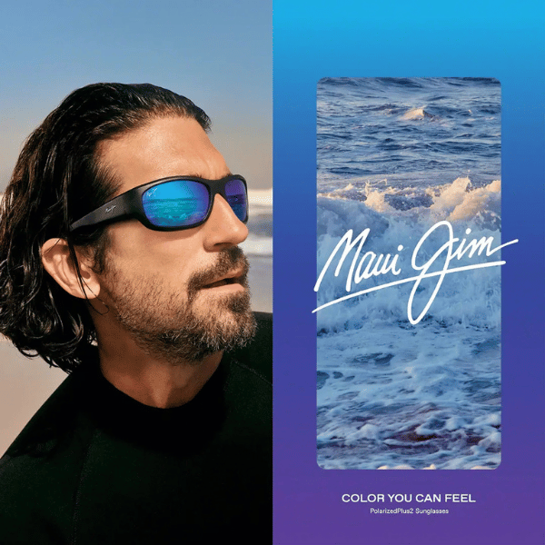 A man wearing sunglasses next to a maui jim advertisement