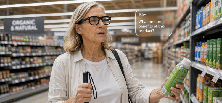 Woman in grocery aisle comparing two bottles, one green and one black, among stocked shelves.