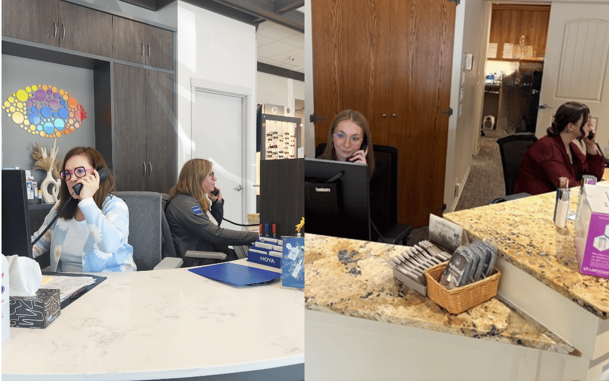 Reception desk with three people working at computers in a bright office lobby