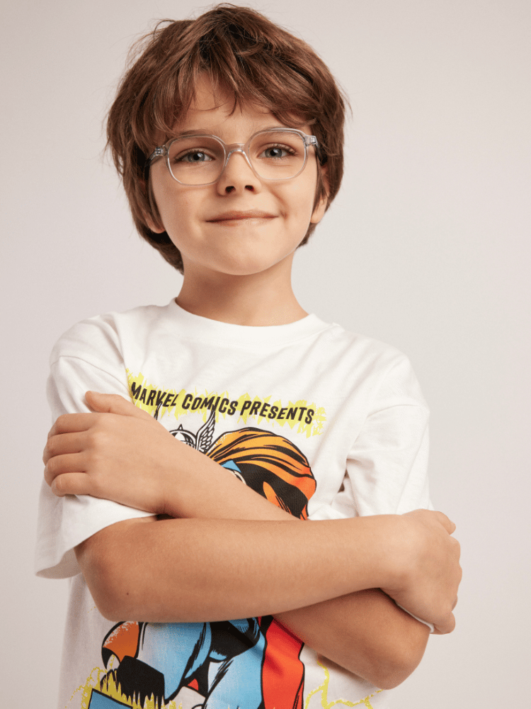 A boy is wearing glasses