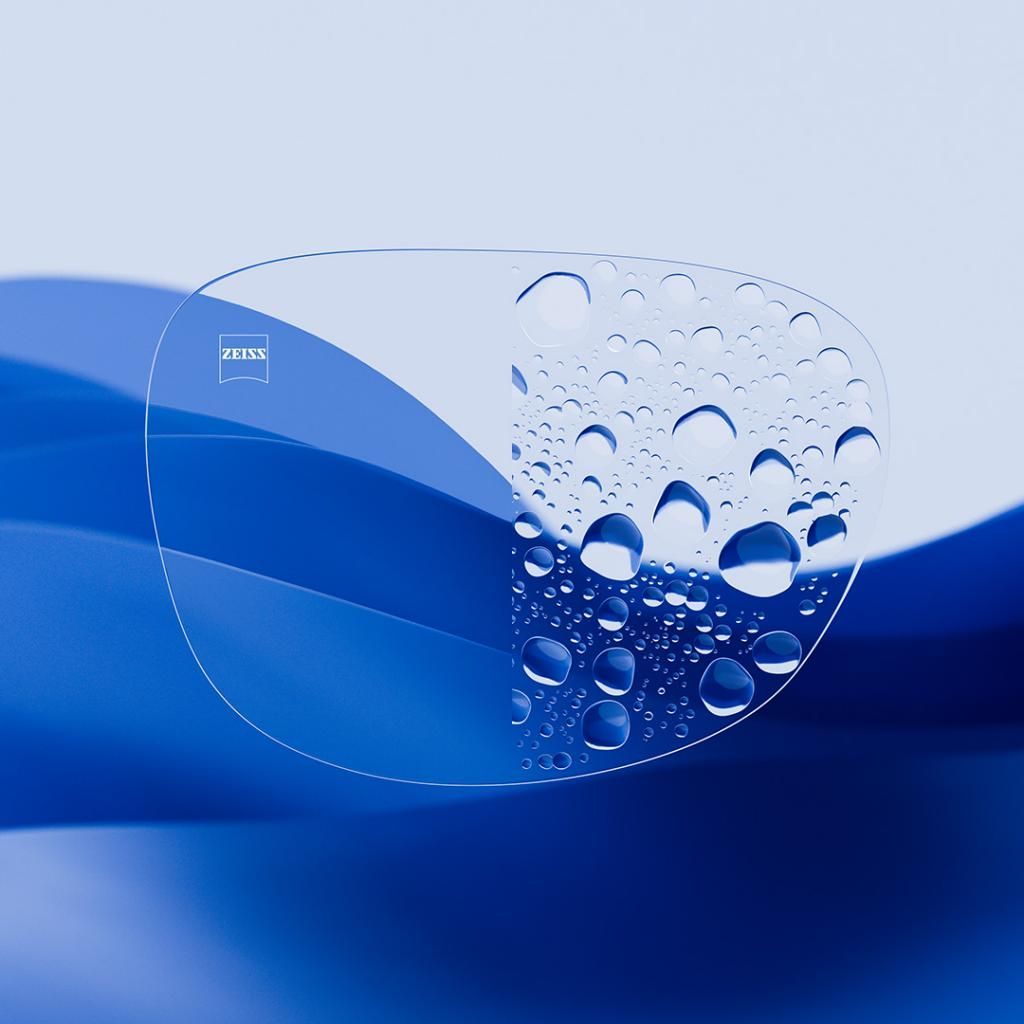 Blue abstract water background with a transparent glass pane and water droplets on the right