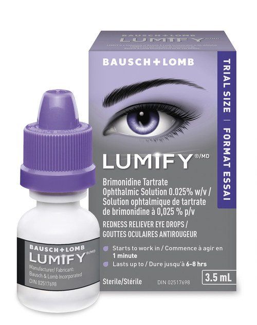 A bottle of lumify eye drops next to a box