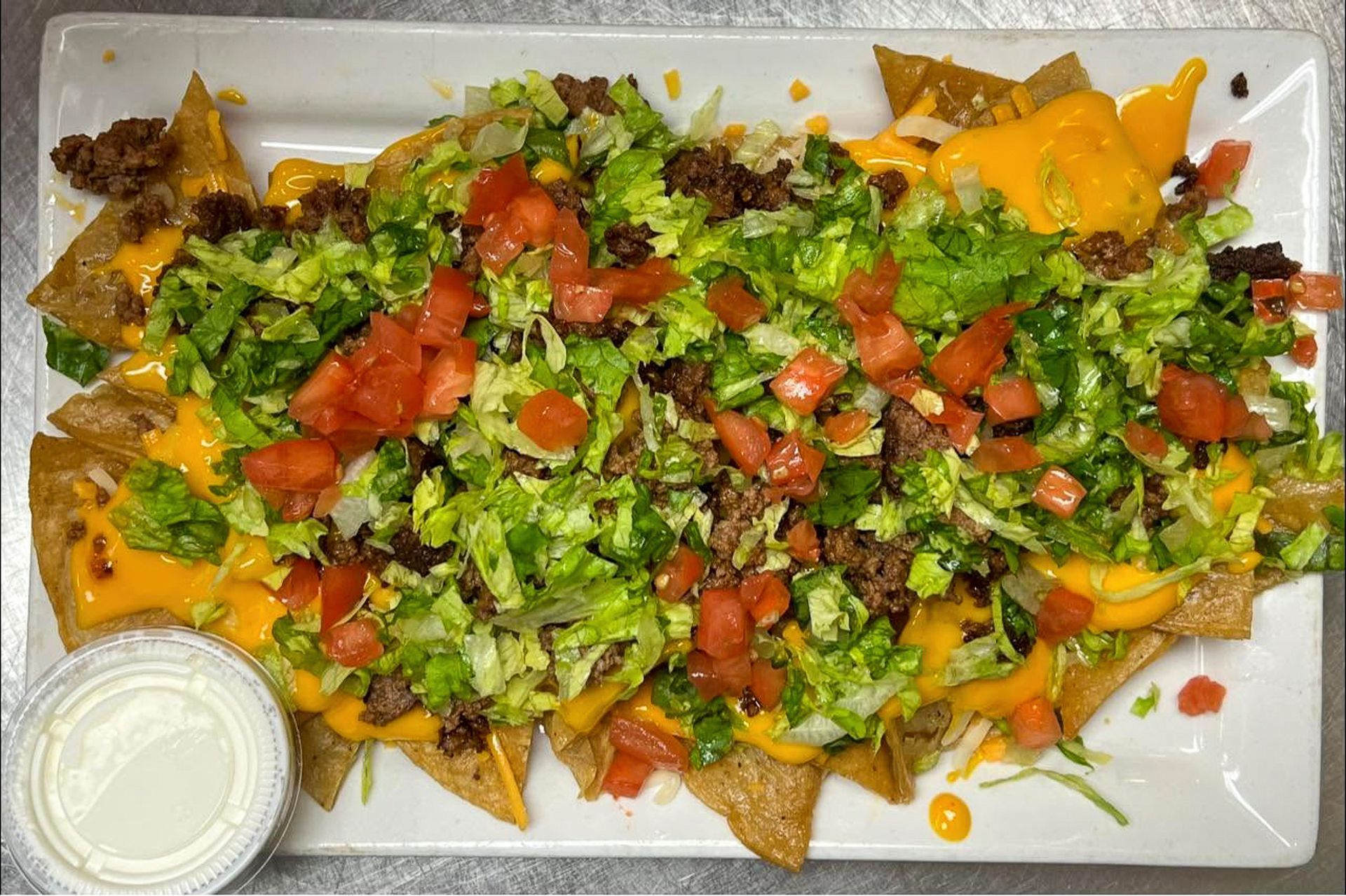 Beef nachos and shareable appetizers at Ralph's