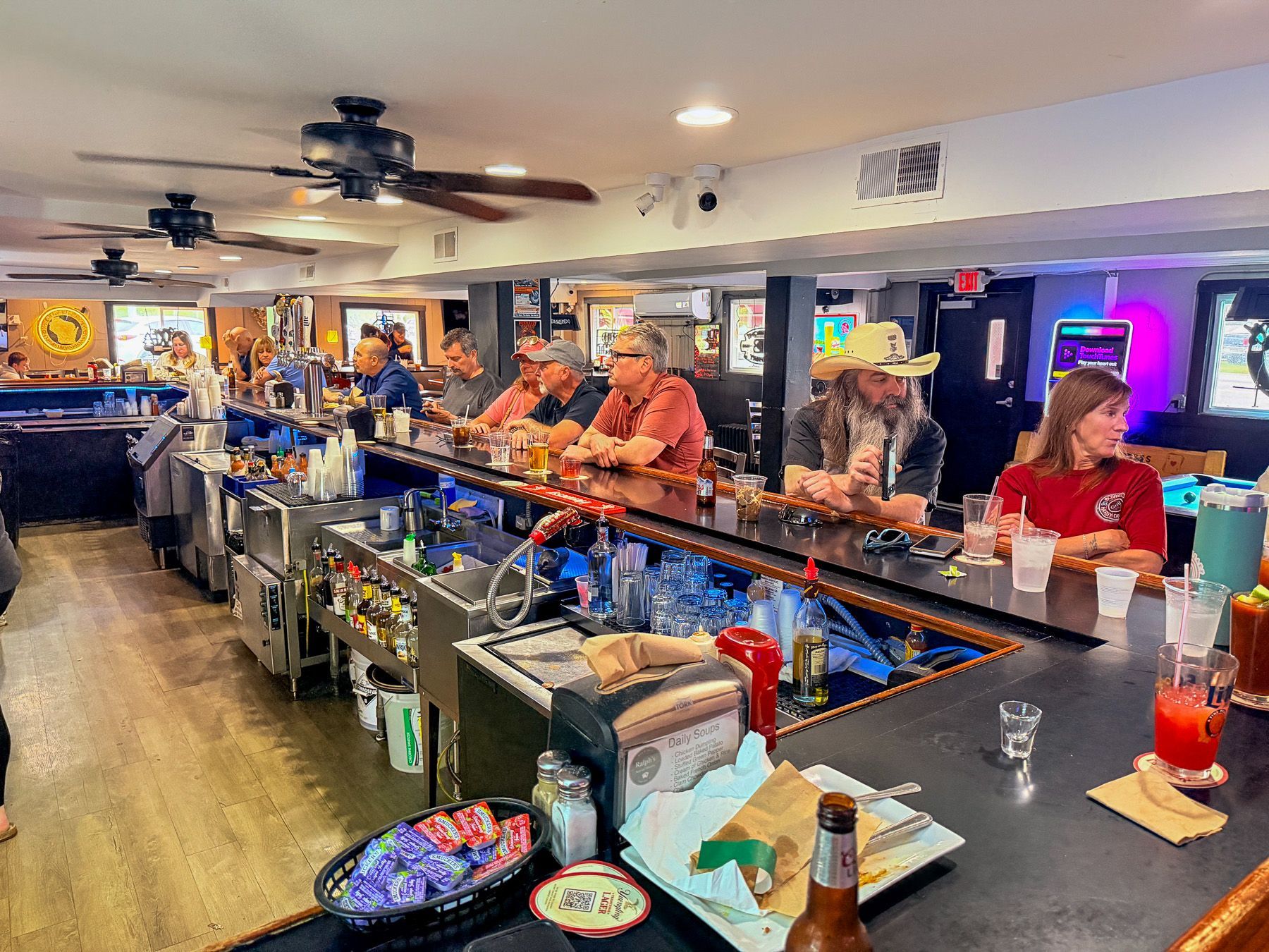 Regulars gathered inside Ralph's Ace of Hearts