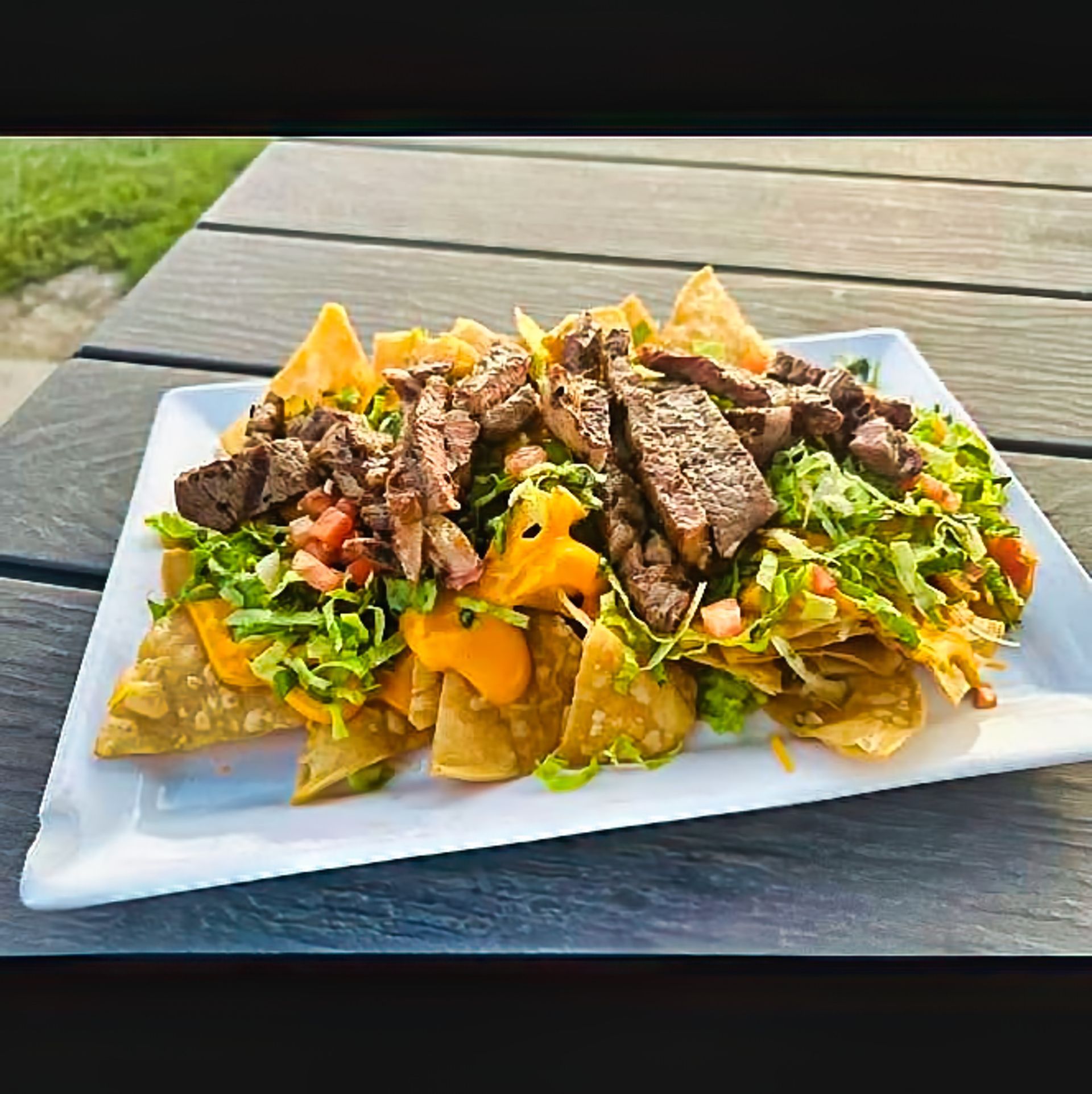 Ultimate steak nachos at Ralph's Ace of Hearts