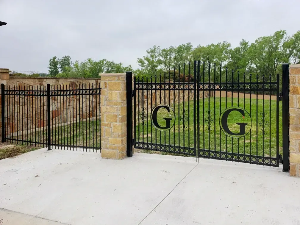 Black metal gate with two large