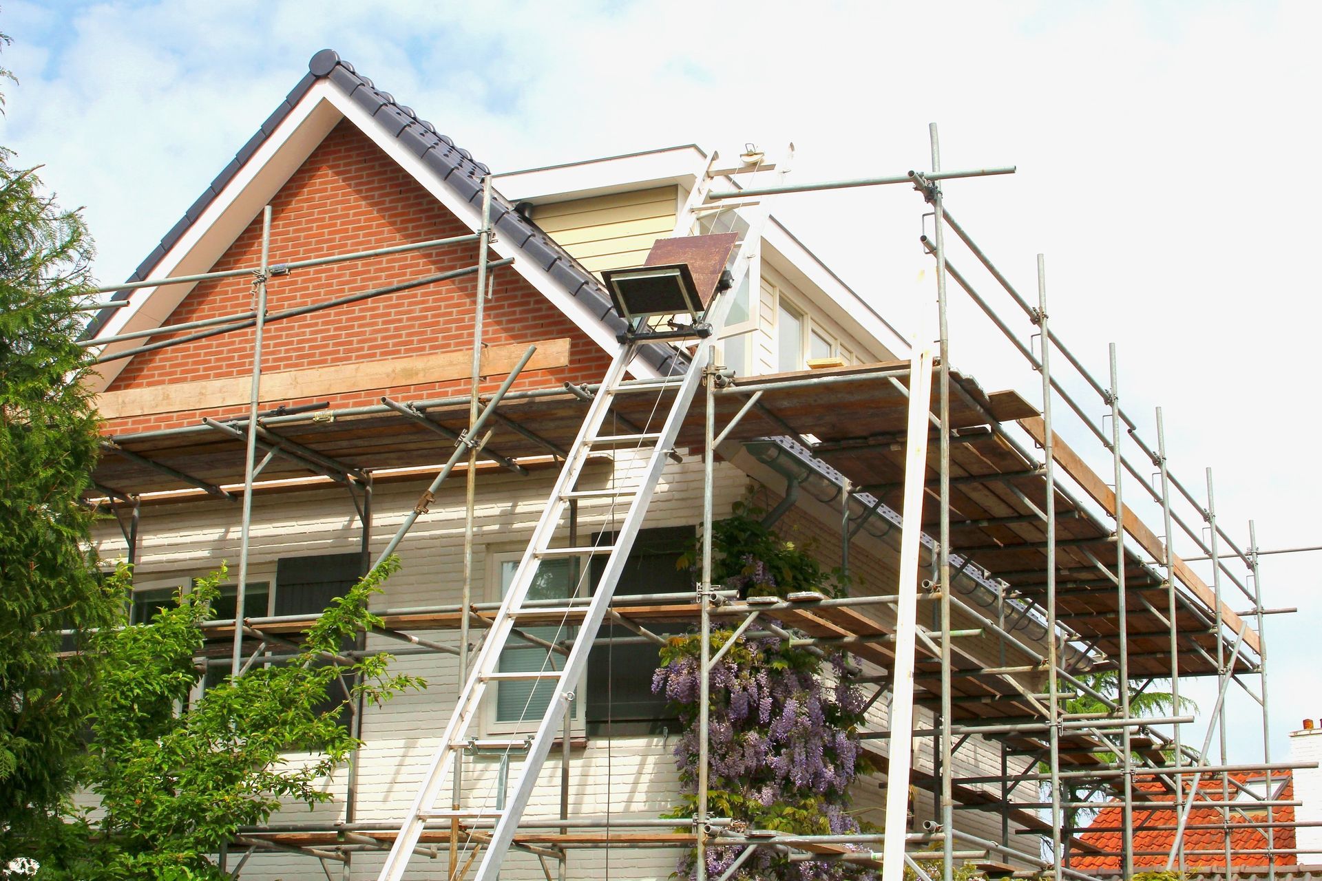 A House With Scaffolding Support