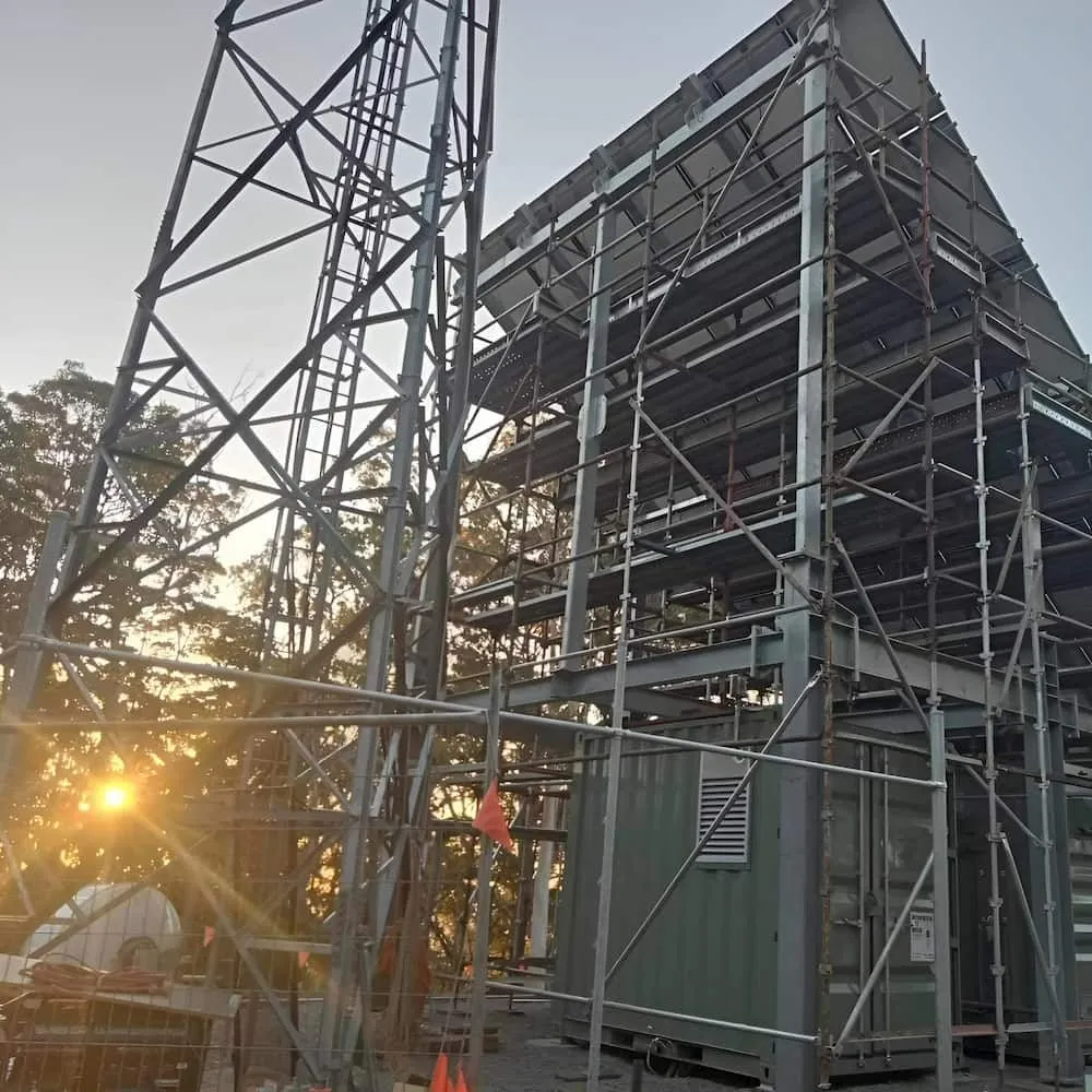 Construction Site With Metal Scaffolding Around  Building